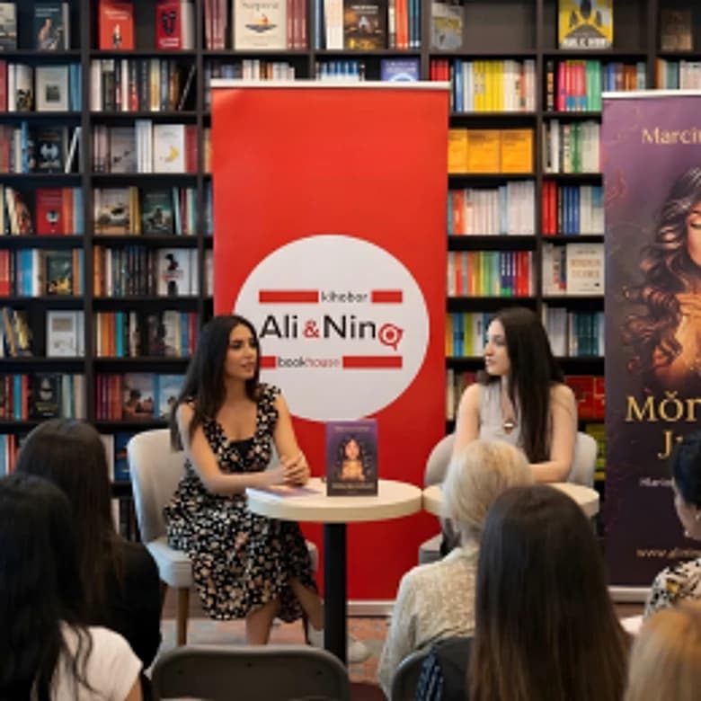 An author talking about her book at a bookshop event