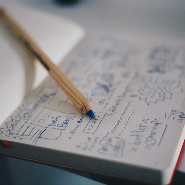 Pencil sketches drawn in a notebook